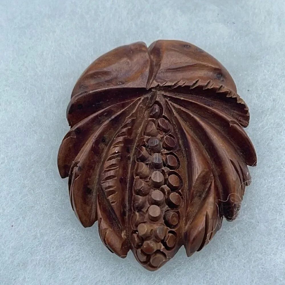 Antique-Vintage hand carved palm tree wood fur dress clip.